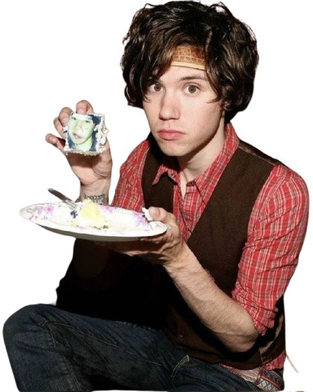 ryan ross holding a slice of cake while facing forward