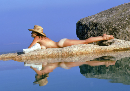 20th-century-man:Sunbather on the Costa Smeralda, Sardinia / photo by Slim Aarons, 1973.