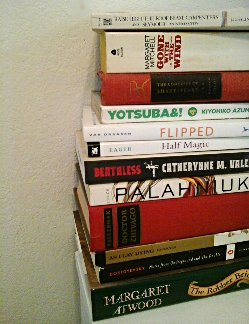 falling-inlove-with-books:Stack of books next to my bed. I either just got them or planned to read t