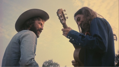 tomoud:  Eric Clapton & George HarrisonScreenshot from ‘George Harrison: Living in the material world’ 