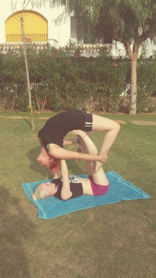 thegirlwiththeeverchanginghair:  MORE! Beth and I doing a bit of acro yoga in spain ^.^  