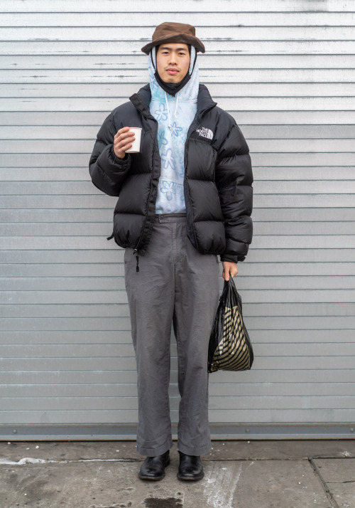 David, 23“I’m wearing Fyre boots, The North Face jacket, Issey Miyake pants, and Chinatown hat
