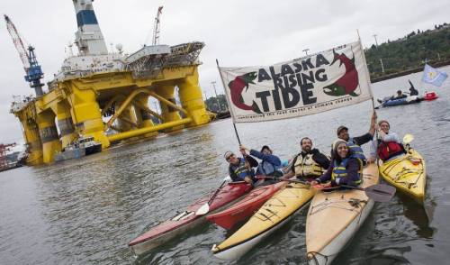 micdotcom:  Awesome photos show the “Shell No” kayak protest in Seattle this weekend This Saturday, hundreds of environmental activists turned out in Seattle to celebrate a day-long festival called the “Paddle in Seattle” and protest Royal Dutch