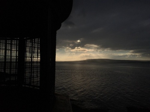 found-fabricated:Evening light over Belfast Lough, the lookout, Grey Point, Northern Ireland.