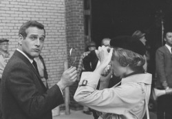 vintagebreeze:Paul Newman holding a mirror for Julie Andrews on the set of Torn Curtain.