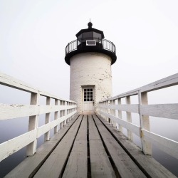 worldoflighthouses:  benjaminwilliamsonphoto: Isle Au Haut LighthouseThis photo dropped through the cracks somehow. I loved traveling out here and exploring. The cliffs on the back of the island were great, but you know that manmade stuff and draws me