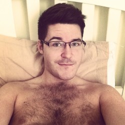 disneyboy1982:  thunderponyfagwash:  Parks &amp; Rec is on. We’re not moving from bed! Hangover day! #instagay #instagayboy #ChestRug @lynzface  FUCK  FURTASTIC