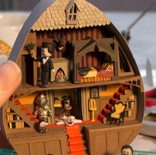 vixenofcourse: spookyloop:    Addams Family ‘Polly Pocket’ House, made from paper and sculpey by Adeena Charlotte Grubb (@adeenagrubb)  @zombeesknees 