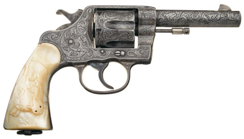 Factory Engraved Colt New Service Revolver with steer head carved pearl grips. Circa 1901.