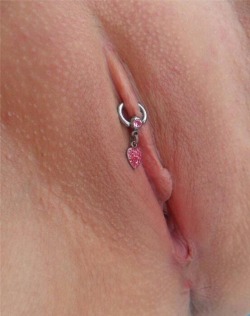 pussymodsgaloreHairless pussy with a HCH piercing with a decorative ring and pendant love heart.