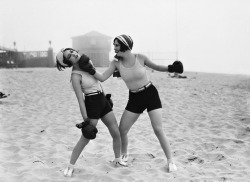 Joan Crawford and Dorothy Sebastian boxing on the beach, 1927.