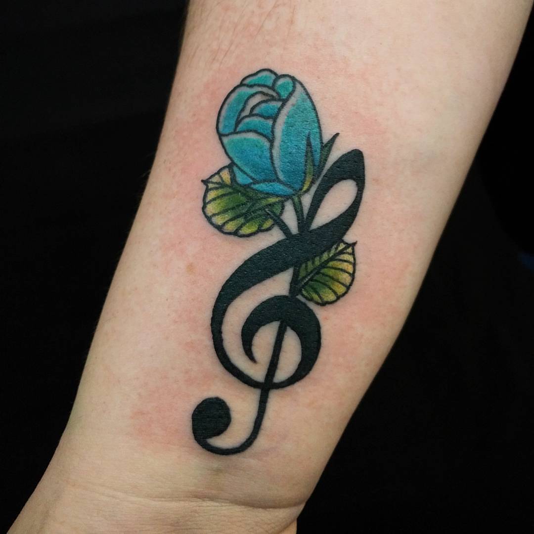 my treble clef tattoo  a rose growing out of it  Music tattoos Music  tattoo designs Trendy tattoos