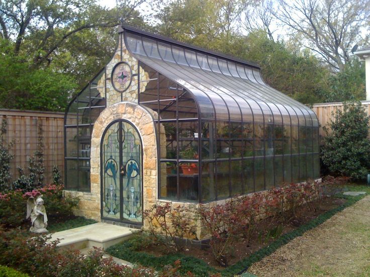 Greenhouse with stained glass doors
