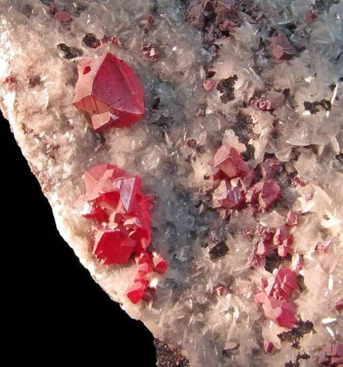 Cinnabar on Quartz Sulphide ores are most often dull and grey, so the bright red colours of this tox