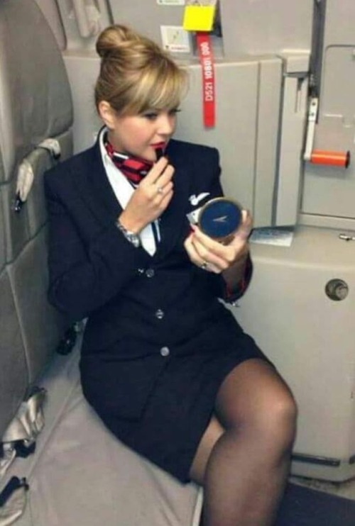 stewardessesandassortedothers: hosestroker: Sexy air hostesses love to make your cock throb. Could h