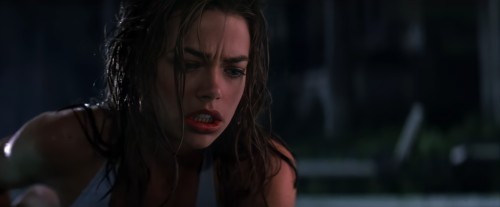 Denise Richards sucking Neve Campbell’s finger.