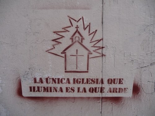 “The only Church that illuminates is a burning one”Seen in Madrid