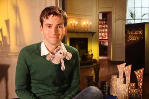 tennydr10confidential: David Tennant being adorkably playful posing with toys.