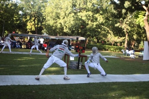 modernfencing: [ID: several photos of a sabre competition, fenced outside on metal strips.] Fencing 