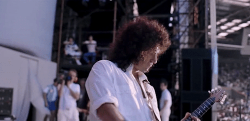sortofflamboyant:The skies were clear at Wembley Stadium in July of 1985, but thanks to Brian May, p