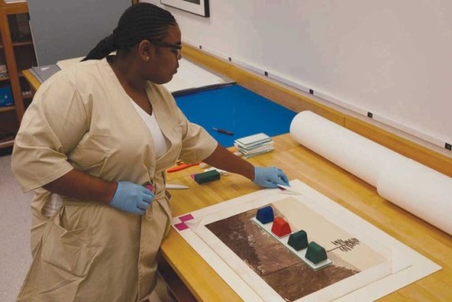  Alicia Bush, an undergraduate at Florida A&M University, dips a toe into the field of cultural 