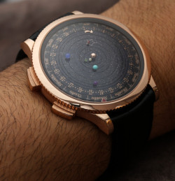 emilysteaparty:  enochliew:  The Midnight Planétarium by Van Cleef &amp; Arpels The movement of each planet is true to its genuine length of orbit: it will take Saturn over 29 years to make a complete circuit of the dial, Jupiter will take almost 12