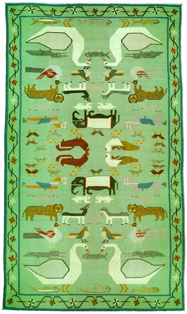 windwrinkle:  19th century Indian Dhurrie rug, with mirrored symmetrical animal design.
