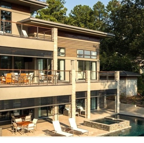 Exterior BirminghamExterior View Of A Massive, Modern, Beige, Three-story Mixed Siding House With A Tile