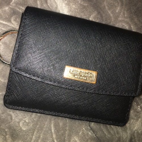 I just added this listing on Poshmark: Kate Spade card holder. poshmark.com/listing/5a091154