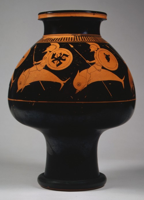 via-appia:Terracotta psykter (vase for cooling wine), hoplites riding on dolphinsAttributed to Oltos