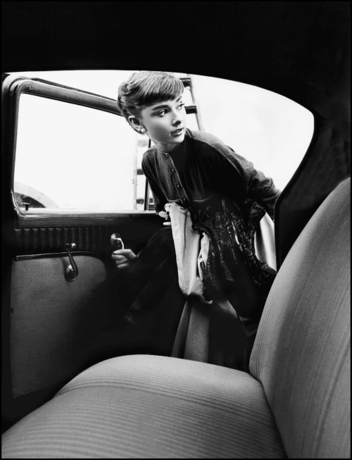 lostpolaroids:Audrey Hepburn gets into the studio car after a long day at Paramount Studios, her fir