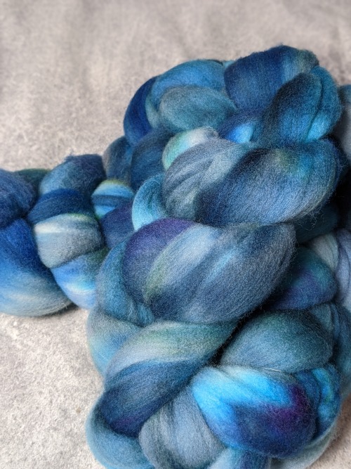 a braid of blue and grey fibre