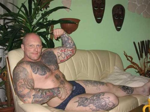 Tattooed muscle daddy. Muscle guts are still guts.