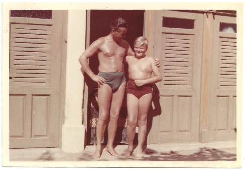 markonpark:Father and son pose outside changing rooms. Original vintage snapshot photo.Etsy: markonp