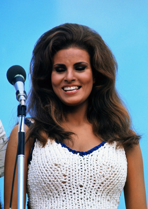 Raquel Welch / while entertaining troops with Bob Hope during his Christmas show, at Bear Cat Base C