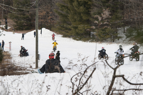 Father and son took a break from skiing to watch the motorcycle races. Appalachian Moto Jam. 