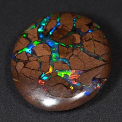 fucktheflagandfuckyou:  holographite:  Boulder Opal  deadass thought this was some sort of magical cosmic cookie and I’m really pissed it’s a fucking rock 