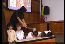 Religious school reenacts decapitation of martyrs who had refused to give up Christianity with little kids. Asociatia Secular-Umanista din Romania (ASUR) atrage atentia asupra unei inregistrari video despre care sustine ca a fost realizata la...