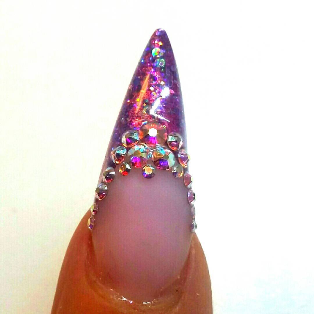 Macro of my new set…@Akzentz #ProFormanceGel cool pink nail bed with #GelPlay purple glitter & pink champagne glitter and #OptionsGel Mulberry & Aurora purple…finished off with @CrystalCultureNails AB Cresent nail design kit #CrystalCultureStylist...