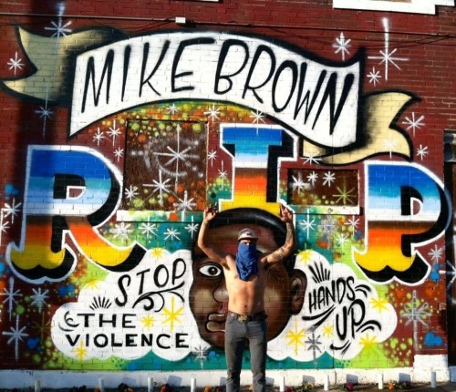Memorial mural  in St. Louis for Mike Brown, an 18-year-old african american who was shot dead by po