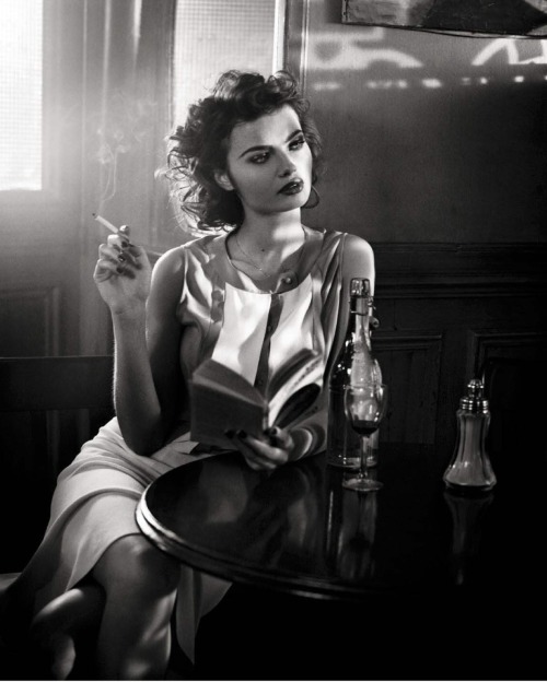 Moa Aberg reading in “Suggestions” for Vogue Italia, March 2015. Photograph by Vincent Peters.”Shirt