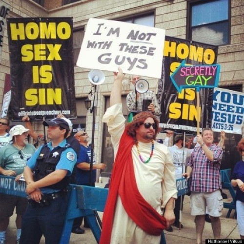 saevuswinds:  thegailygrind:  Cool Jesus at Chicago pride  I’m still laughing at that police officer he’s all like, “God bless you go Jesus” 