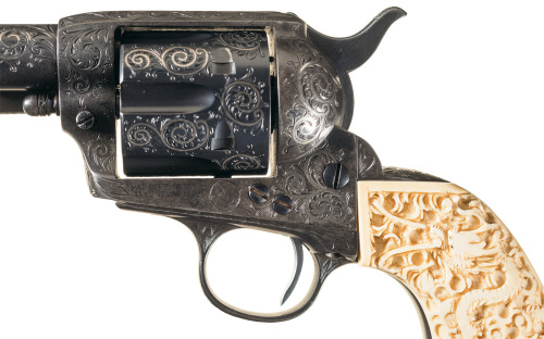 Engraved and gold inlaid Colt Model 1873 Single Action Army with carved ivory grips, circa 1901.