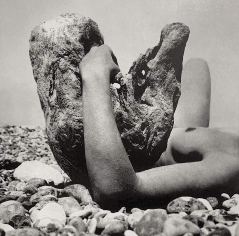 Pierre Jeannereet. Charlotte Perriand holding a piece of driftwood, 1934.