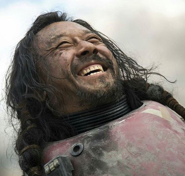 Smiling Jiang Wen as Baze Malbus in Rogue One.