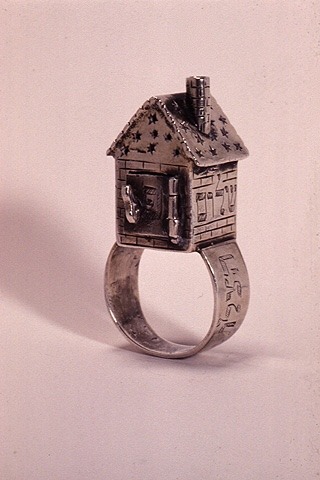 myjewishaesthetic:Silver wedding ring in form of house, with chimney and hinged door with handle, ci