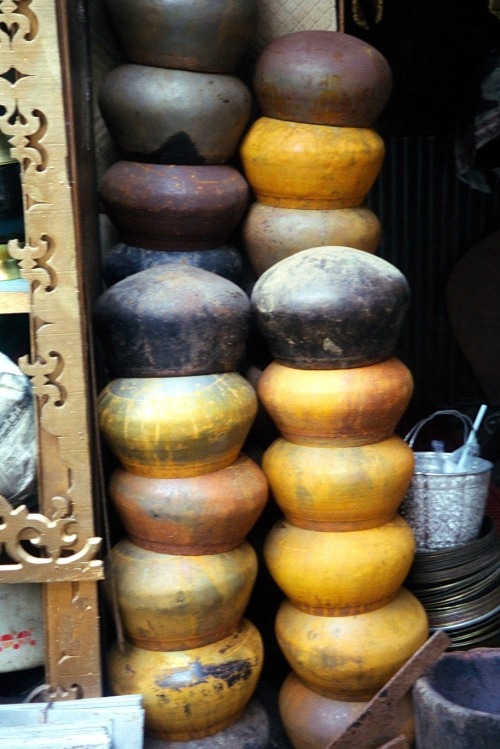 “Buddha Bowls,” Bangkok, 2000.Young Buddhist Thai men are expected to serve a term as a 