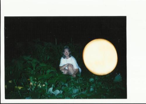 cabesmeadow:pictures of my mom in her garden at our old house that somehow mixed with my dad’s pictures of the moon. i’v