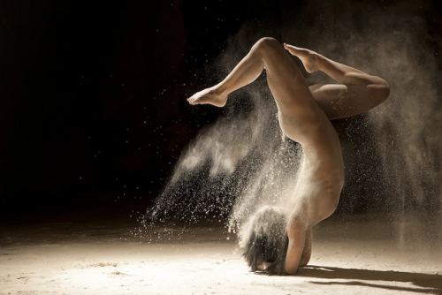 adventuresinhires:  Poussière d’étoiles (Stardust) is a series produced by the French photographer Ludovic Florent. It showcases dancers brimming with adding flour. Sand grains accentuate the majestic movement choreography. 