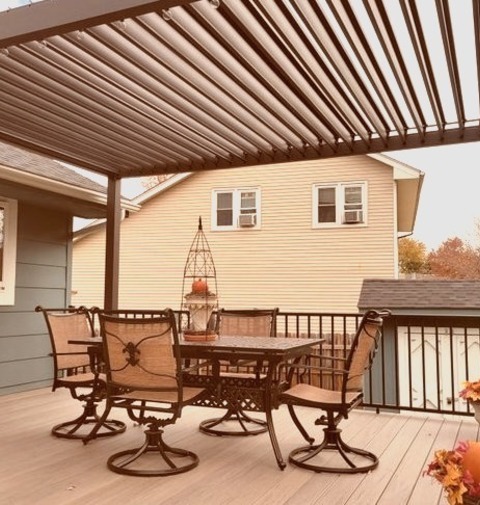 Pergolas - DeckInspiration For A Large Backyard Ground Level Metal Railing Deck Remodel With A Pergola